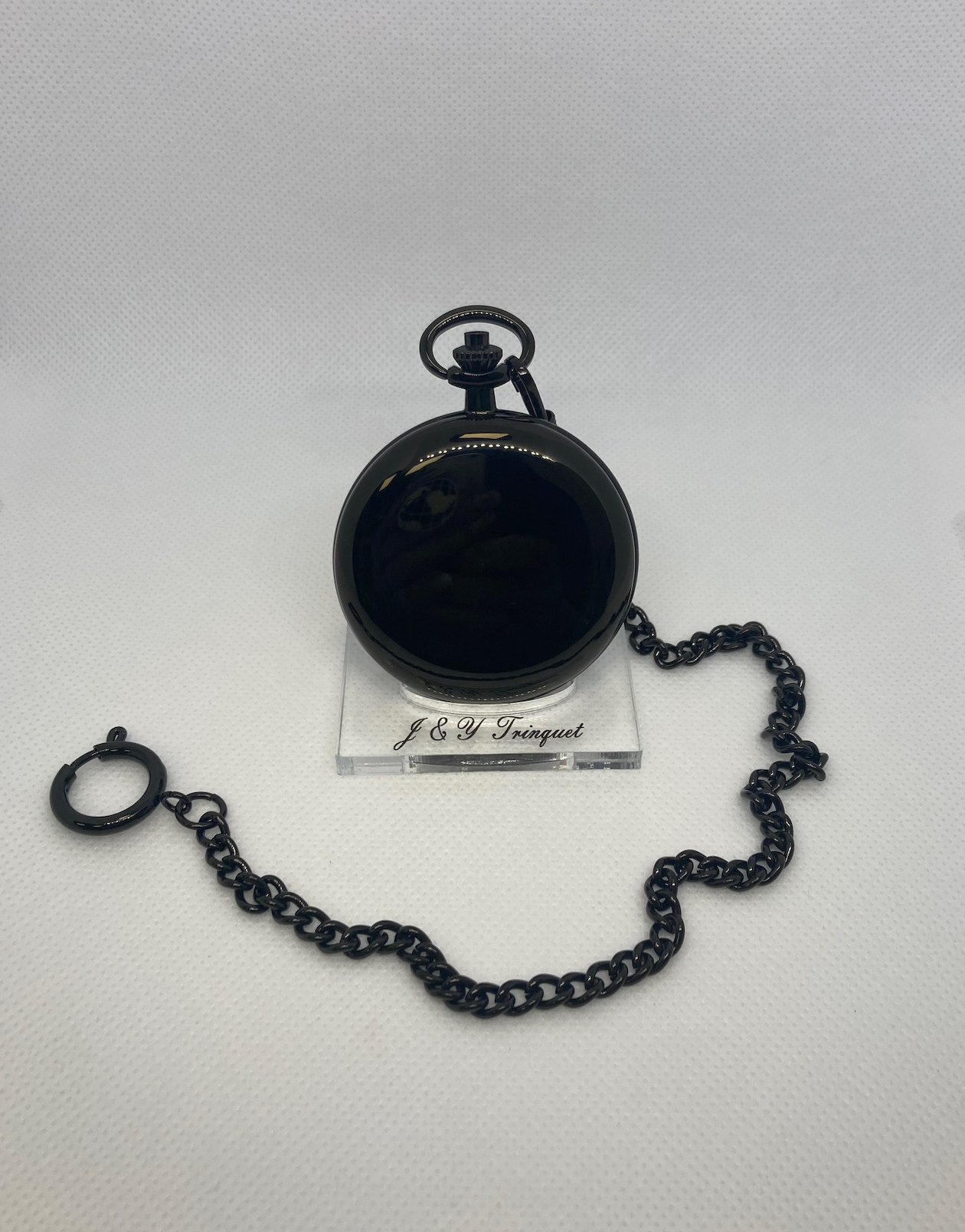 Montre à gousset noire brillante